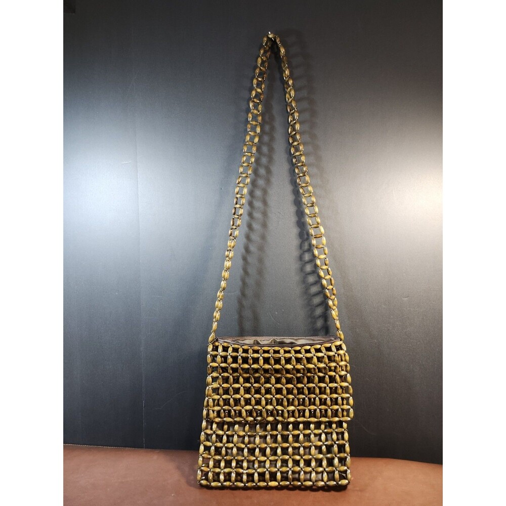 wooden beaded handbag by Liza Ganz New York Naturals featuring a woven bead...